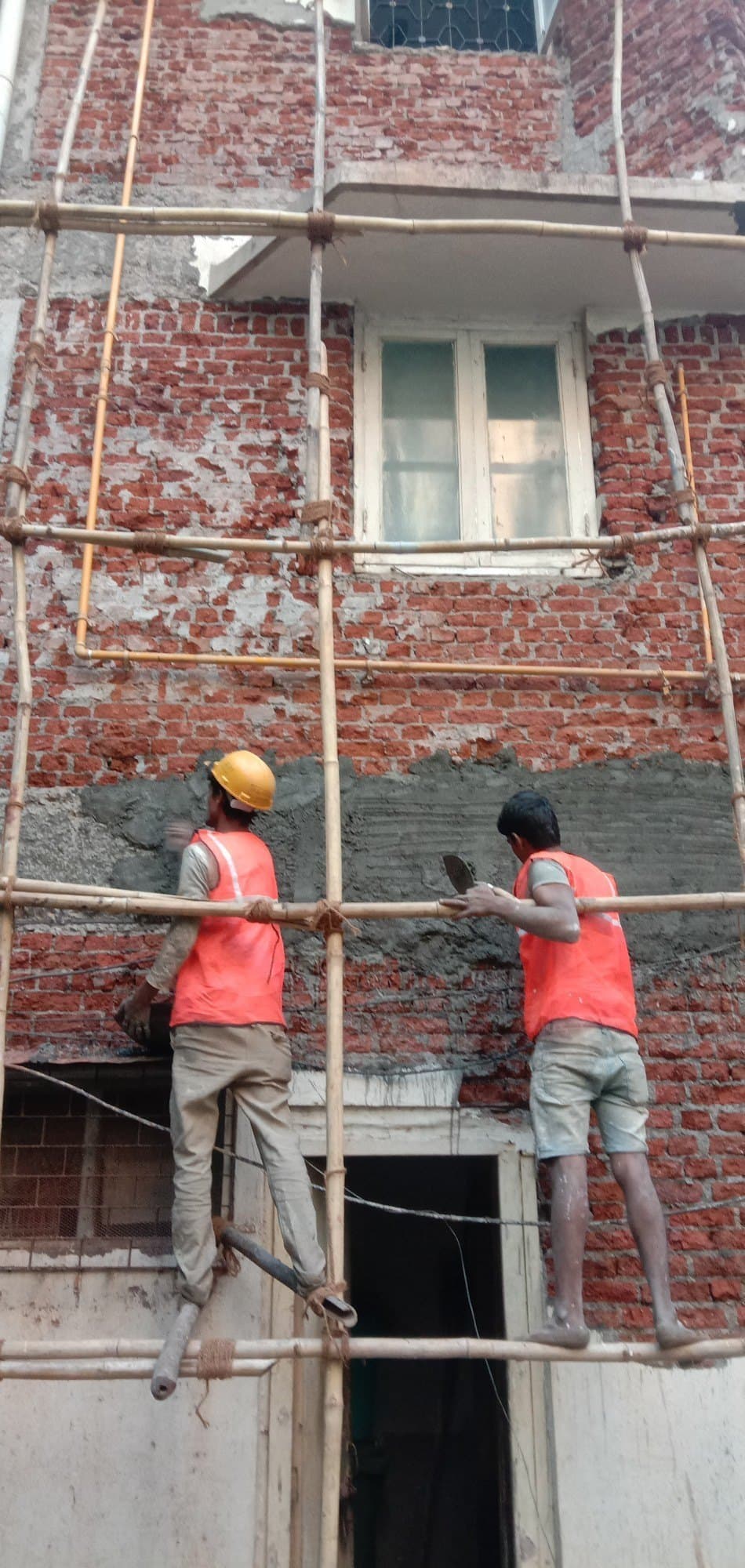 Eastern Engineering team working on a building facade